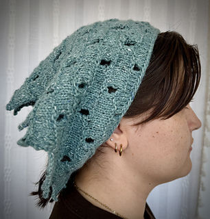 With the button system, can be worn like a head scarf...