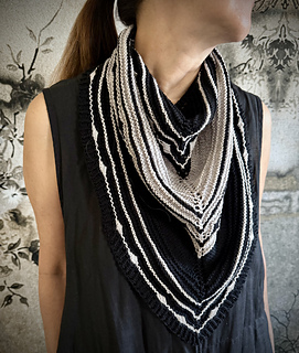 Malabrigo Sock:
"Black" #195
"Pearl" #036