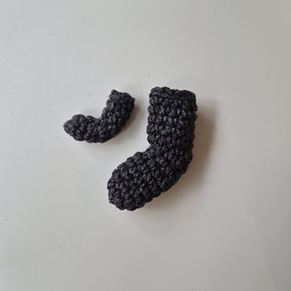 The pattern include Dobby's signature sock in two different sizes