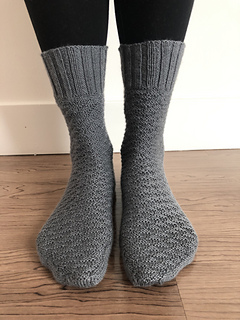 Ravelry: Triangle Motif Socks pattern by Emma Bermudez