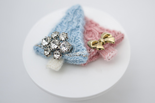 A knitted Xmas tree there is a bit smaller than the other 4 designs