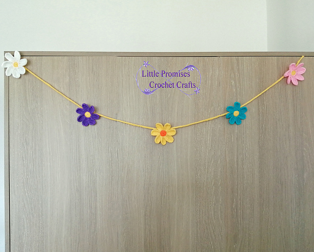 Ravelry Spring Flower Garland pattern by Vivienne Caveney