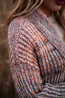 Model is wearing a size 41" with 7" positive ease