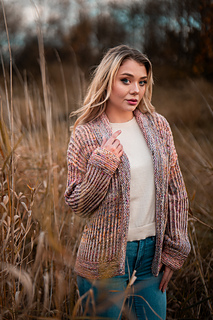 Model is wearing a size 41" with 7" positive ease