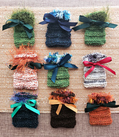 The first nine. They turn out slightly different sizes because I'm using handspun scraps with various thicknesses. 