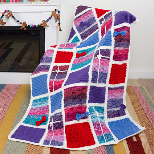 Wrapped In Gifts Blanket - Red Heart Design Team