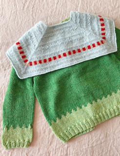 Mini size placed on sweater for 3-4 years old