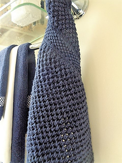 Ingenuity towel explores textures based on slip stitches and variances in gauge.