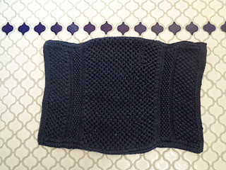 Variances in gauge among stitch patterns add to the rustic charm of this everyday heirloom towel.