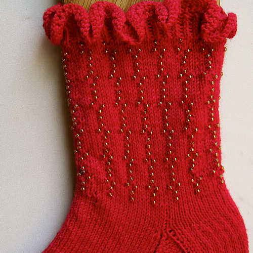 Ravelry: Beaded and Ruffled Sock pattern by Linda Lehman