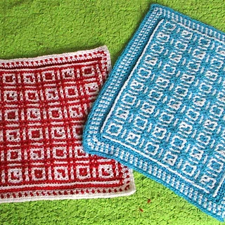 Crocheted by Miloslava; red uses mosaic technique, blue uses interlocking. She also added a fancy border.