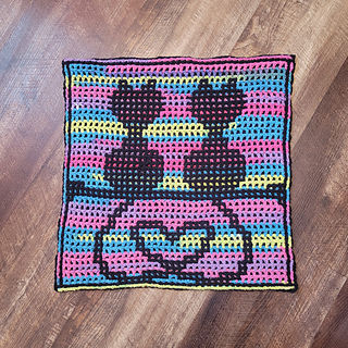 Interlocking crocheted by me - black as main color, rainbow stripe as accent color