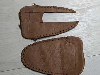 Cut out a piece of leather from Alex's slippers for the tag.