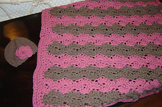 Brown and Pink Blanket and Hat