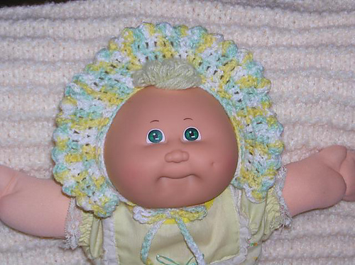 cabbage patch doll with bonnet