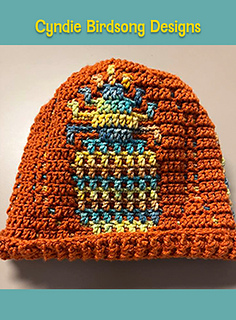 Tester Teresa made a spunky little beanie in nice warm colors - great use of variegated yarn!