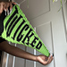 Person holds Wicked pennant