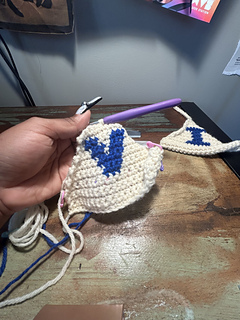 Model actively crochets Virgin Islands bikini