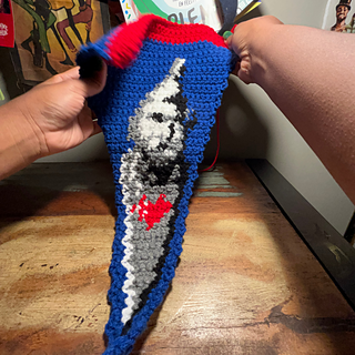 Crochet flag displayed on a desk