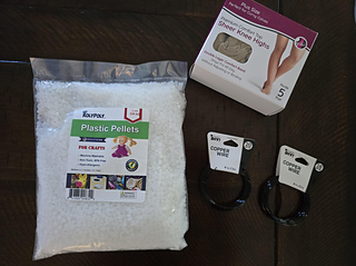 Beads and knee highs= weight for the base of the Santa Gnome.
Jewelry wire = Glasses for the Santa Gnome.