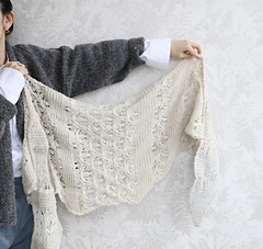 The white sample was knitted using threads of various thicknesses.
