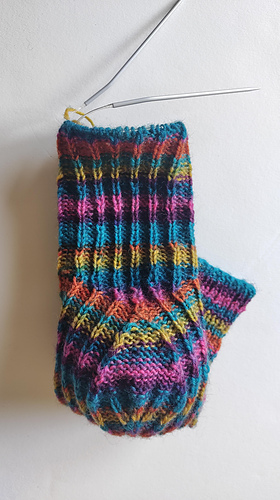  Short rows added after finishing the heel decreases (the brown-orange triangle)