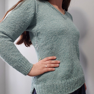 Pre-block try on, side view to show underarm gusset and split hem