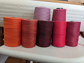 the bright orange was too bright for this warp, but I'm sure it will show up in the weft at some point ;)