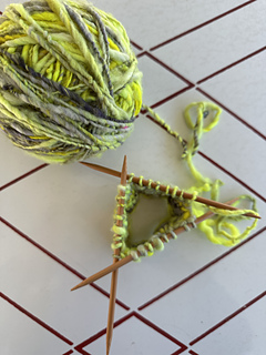 Divide stitches between 3 double pointed needles and join in the round.