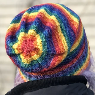 The view of the back of a slouchy hat showing concentric rainbow rings.