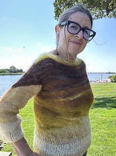You can see from the ombre color change how the sleeve was constructed first with short rows to "square off" then finished in the round down to the 3/4 length cuff