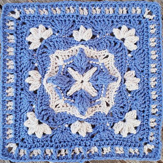 blue and grey crocheted fancy granny square