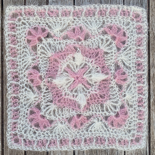 pink and cream fluffy laceweight crocheted fancy granny square