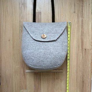 After fulling and finishing measurement - with closed flap. Approximately 13” wide and 15” long