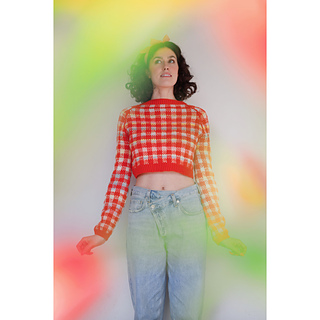 40" garment on 36" bust. Body knit to 7". Sleeves knit to 20" (model is 5'9" with long arms.)