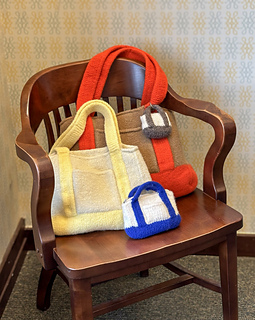 all the sizes sitting in a chair