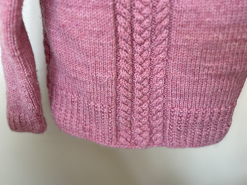 Ravelry: Simple Raglan Cable Sweater pattern by Lara Simonson