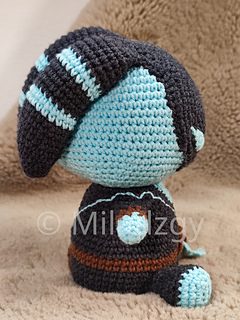 Thresh from League of Legends, crochet toy made by amigurumi technique. Used dark grey, turqoise and brown yarn. Right side.