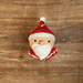 Santa Claus, Christmas crochet bauble. Festive decoration to hang on the Christmas tree. Red and white cap, collar, white beard.