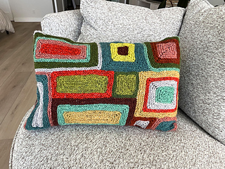 Pillow made from a single section, while yarn held single.