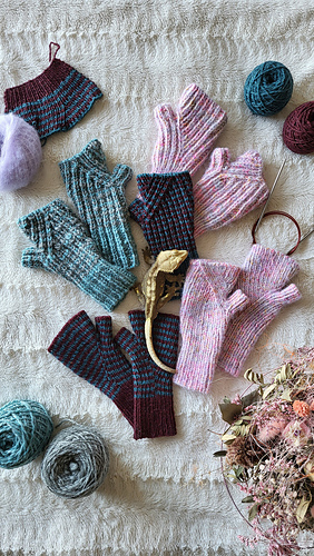 Blue: Aran, half-brioche
Pink on top: Aran, half brioche
Pink, bottom right: Aran, ribbing
Dark stripes, middle: DK, half brioche
Dark stripes, bottom left: DK, ribbing