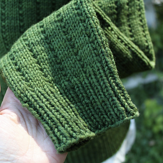 Sleeve detail; Size 2 knit by Heather @sewhappyjane in Sew Happy Jane Meadow DK, color Envy