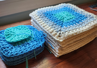 On my way to completing 15 squares total. Cloud Blue color was only able to complete 14 squares with 2 skeins.