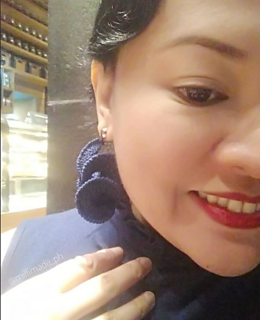 Wearing my Genoveva earrings