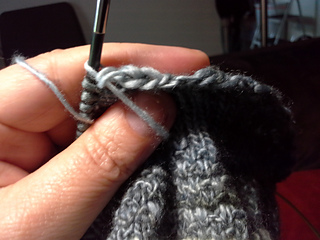 Bind off - forward pass 2 stitches off left needle over the wrap.
