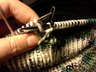 Purl into the stitch below.