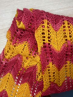 scarf scrunched up to see cables and eyelets