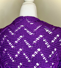 close up of back with madeira pattern on dress form