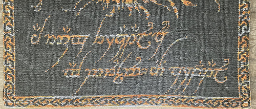 Eye of Sauron Double Knit Blanket showing bottom edge of Black Speech side