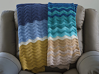 This photo shows both blanket patterns: Classic Blue (left) and Teal Ombre (right)